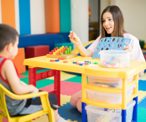 An RBT plays a game with a child